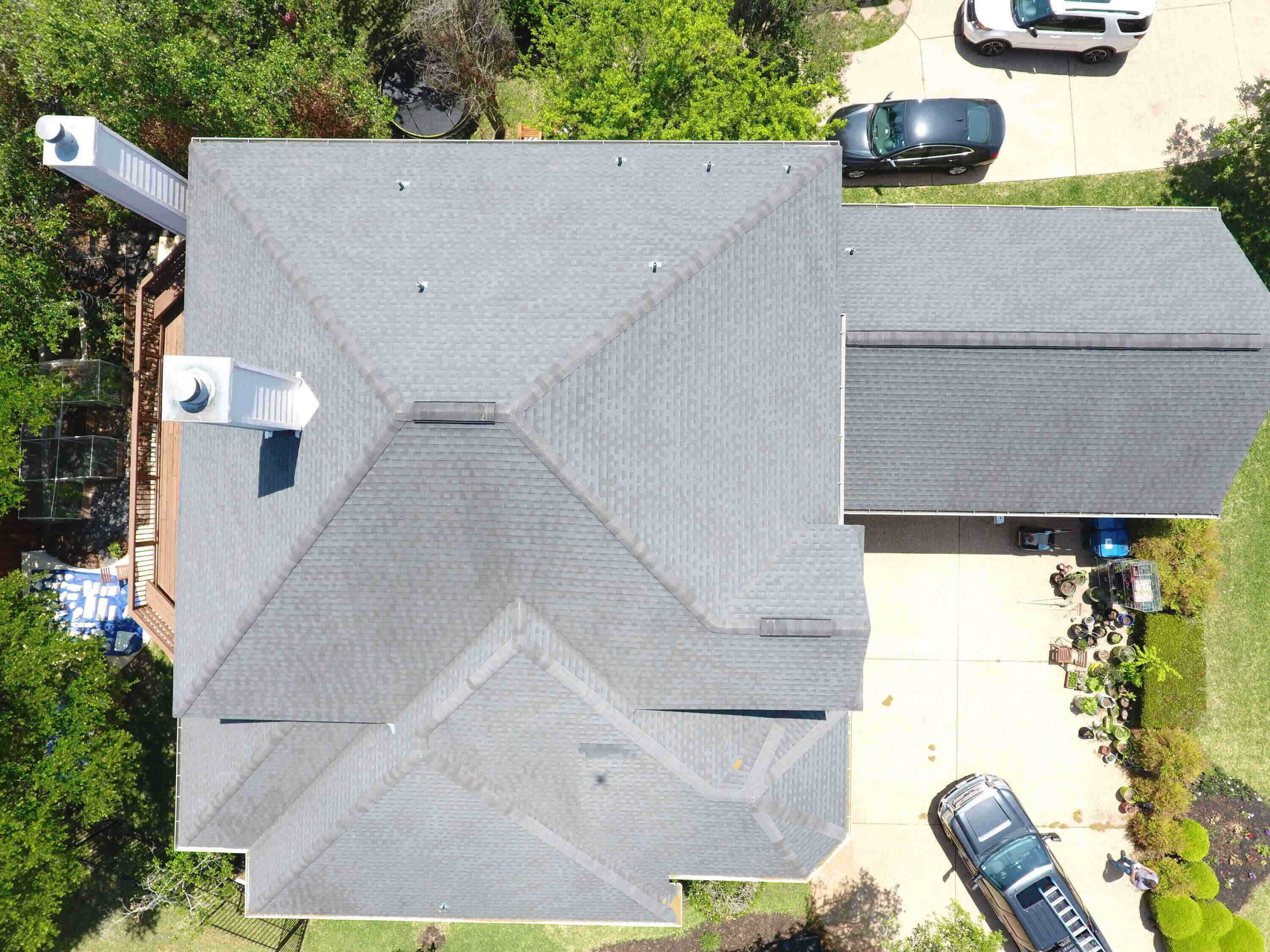 house with new asphalt shingle roof